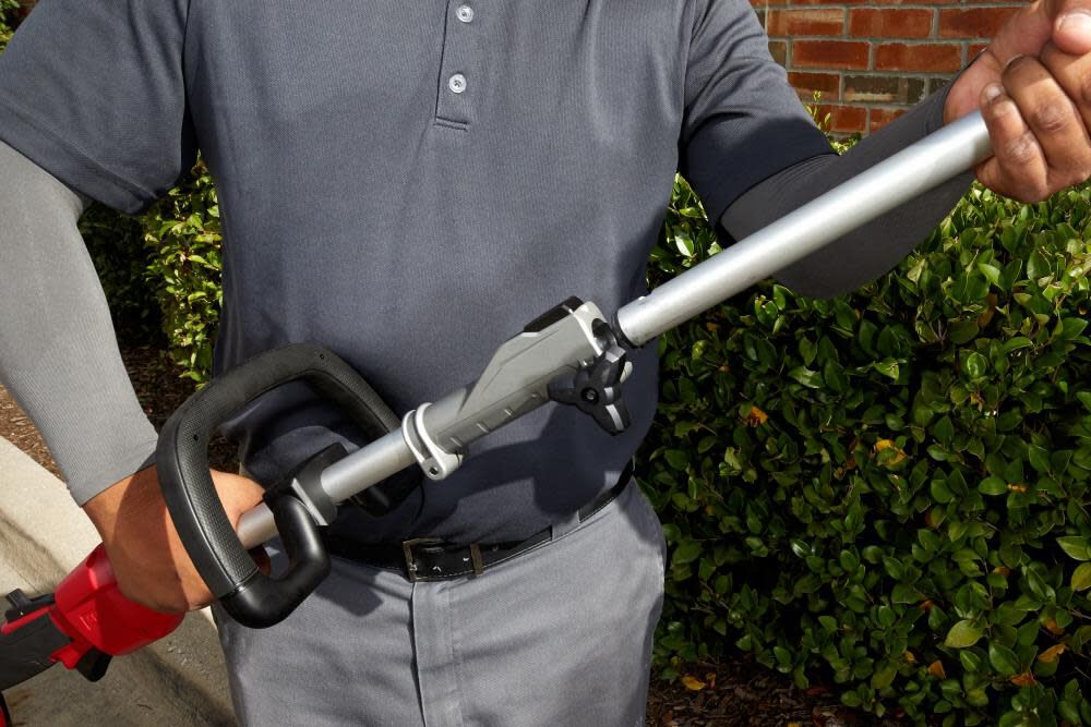 Milwaukee m18 fuel best sale string trimmer shoulder strap